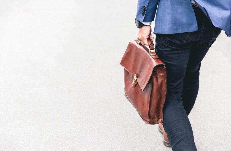 Man walking with briefcase Image for no excuse for poor performance